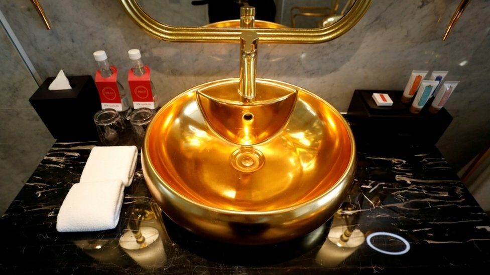 A gold-plated bathroom sink is seen in the newly inaugurated Dolce Hanoi Golden Lake luxury hotel