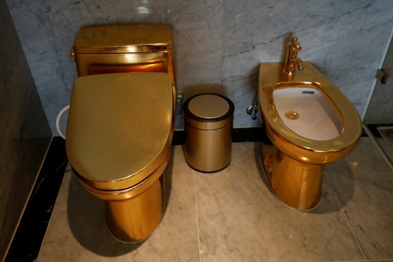 Gold plated toilets are seen at the newly-inaugurated Dolce Hanoi Golden Lake hotel