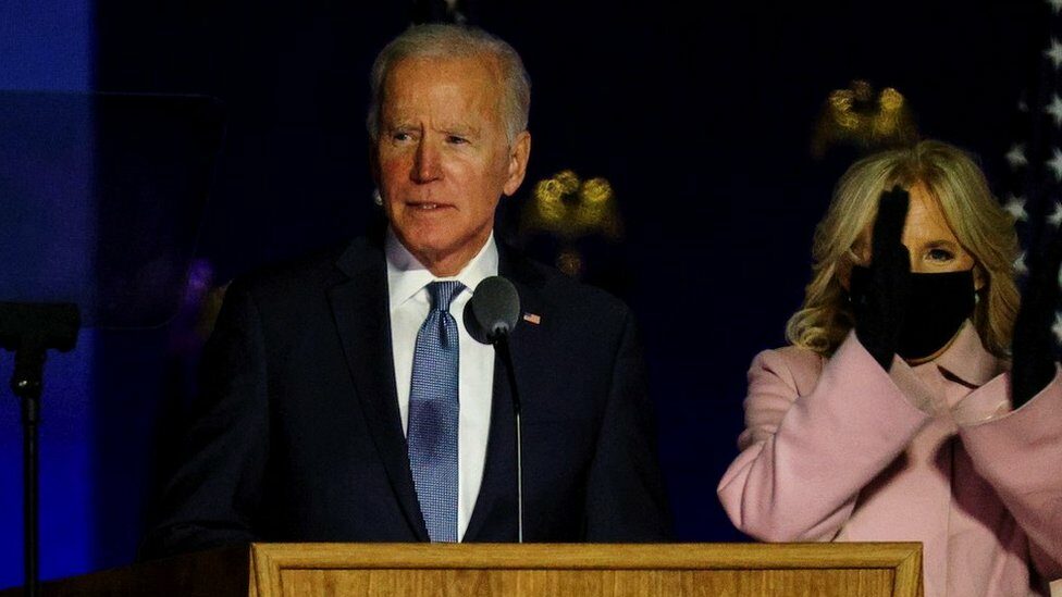 US Democratic presidential candidate and former Vice President Joe Biden accompanied by his wife Jill deliver remarks after the first results of the 2020 US presidential election in Wilmington, Delaware, USA, November 4. 2020.