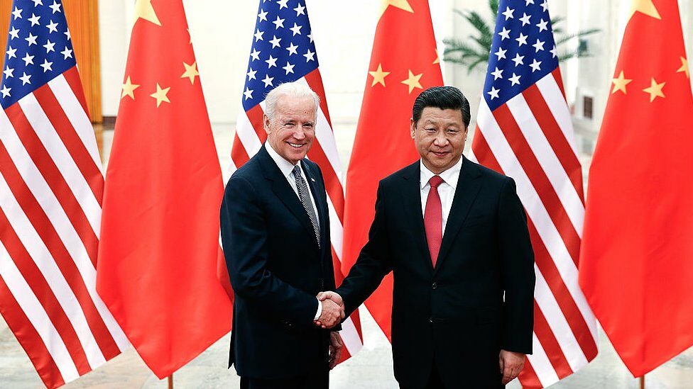 China's President Xi Jinping (right) shakes hands with US Vice President Joe Biden (left) on Dec. 4, 2013 in China's Beijing.