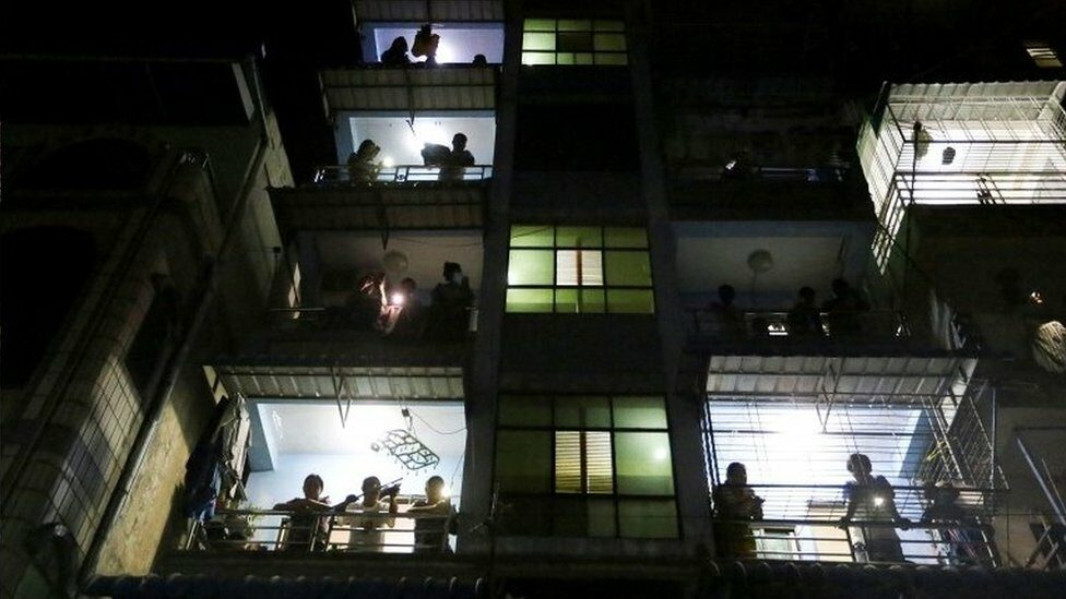 People in Yangon protested the coup by hitting the container on the balcony.