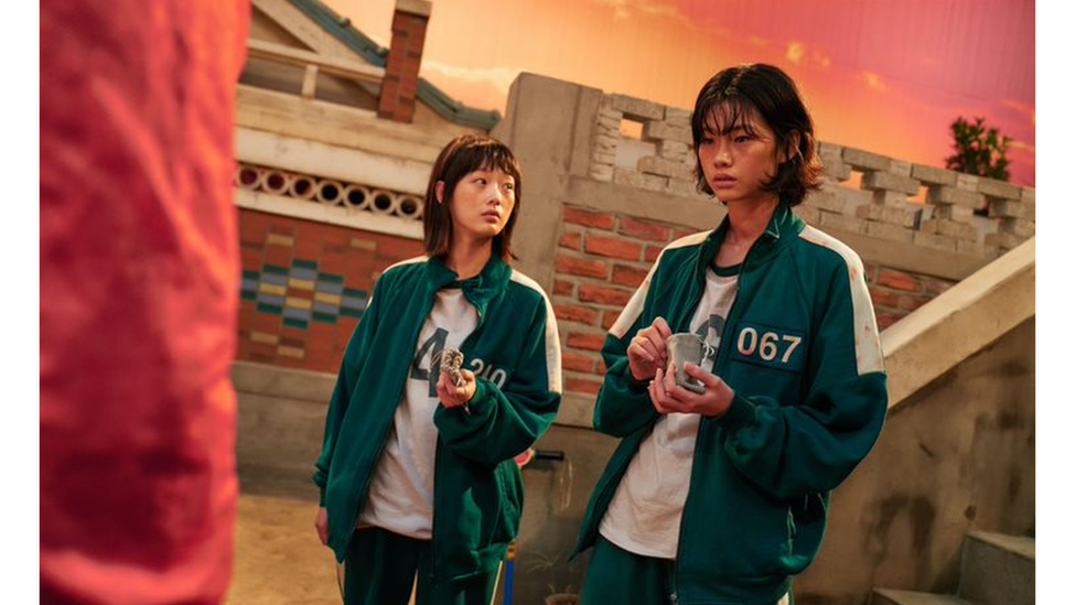 Sae-byok played by model Jung Ho-yeon (right), a North Korean defector, in a scene from Squid Game