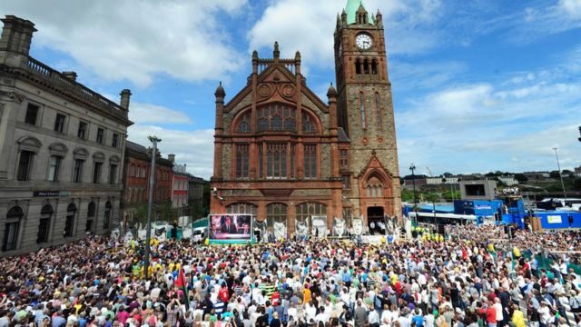 Supporters of the Bloody Sunday victims' families in Derry's Guildhall Square