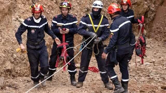 Moroccan emergency services teams work on the rescue of five-year-old boy Rayan from a well shaft