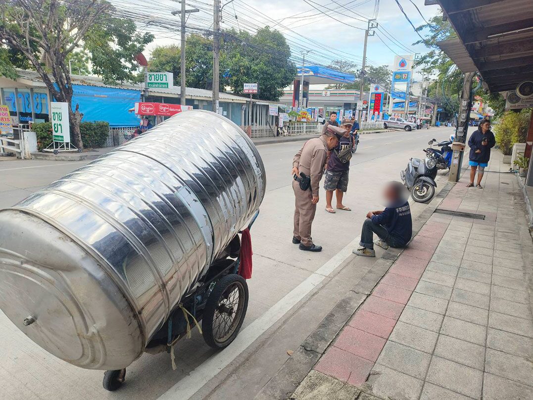 Police having a word with the man who stole the water tank